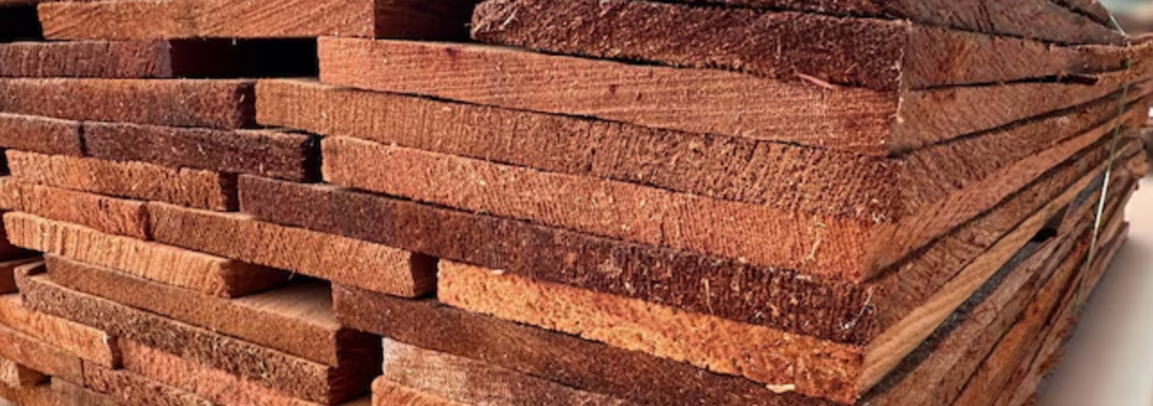 Close-up of Western Red Cedar Shingles wood grain showing natural cedar siding color variation